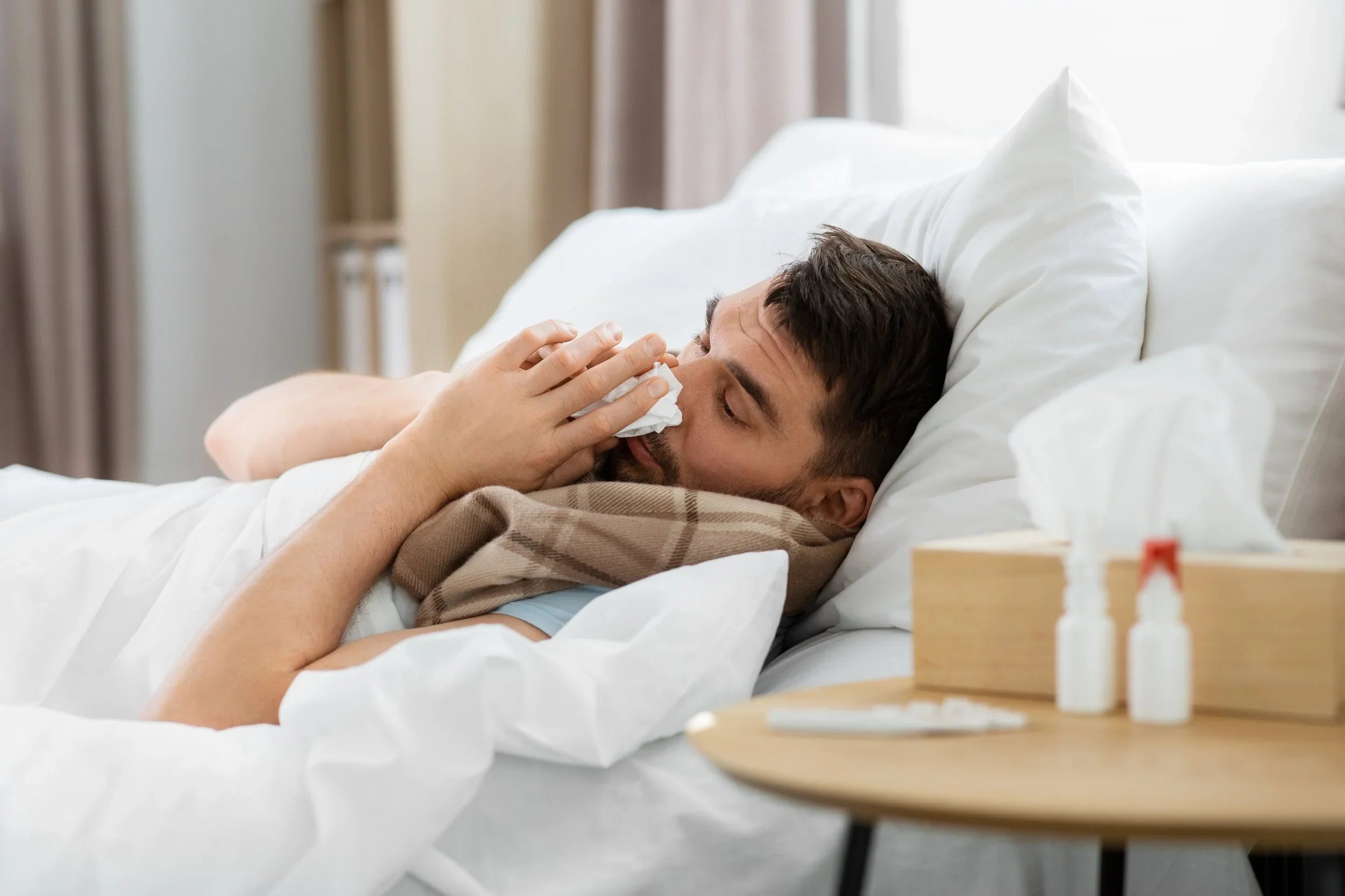 Image of Man in Bed with Cold or Flu