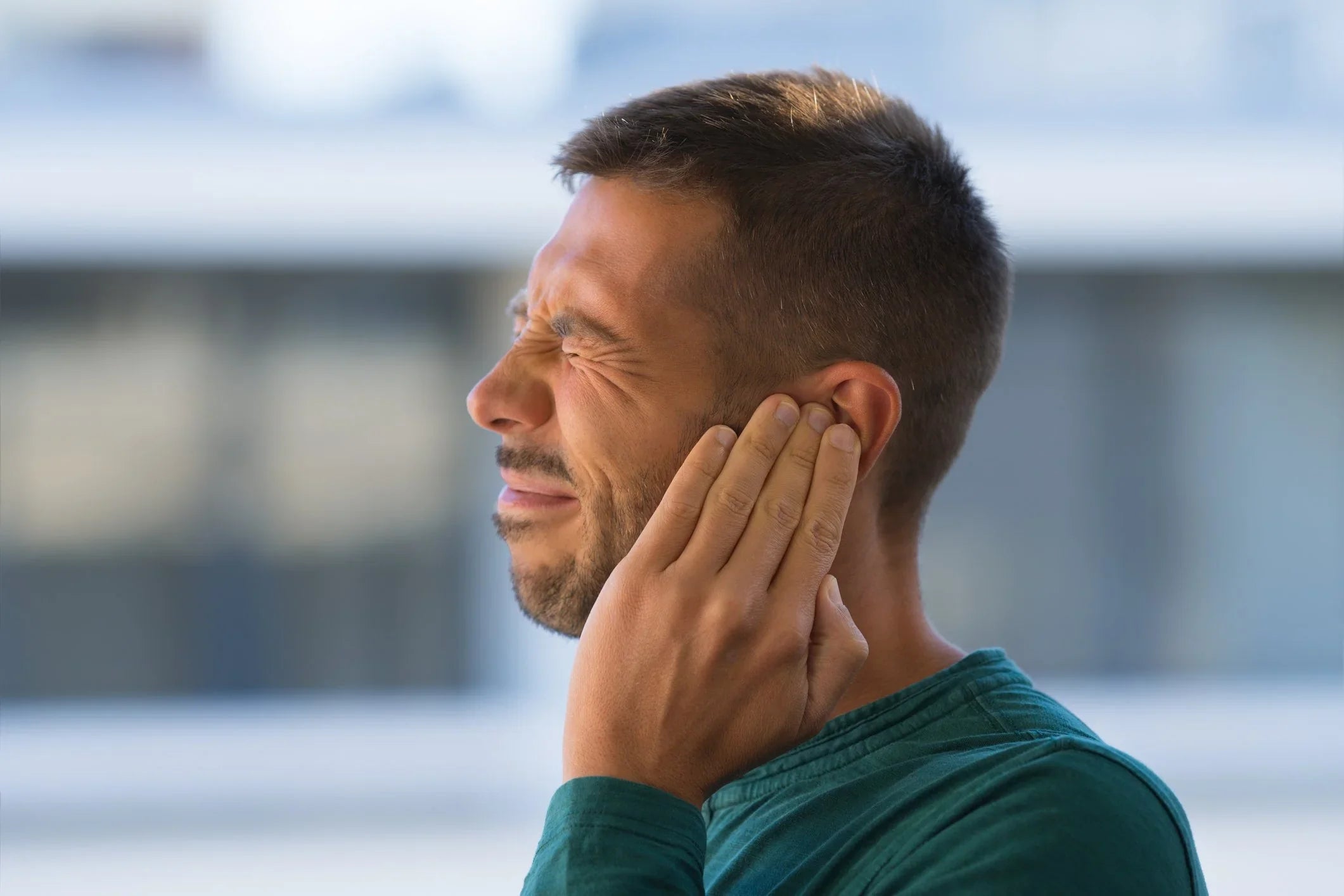 Image of Man with Ringing in Ear