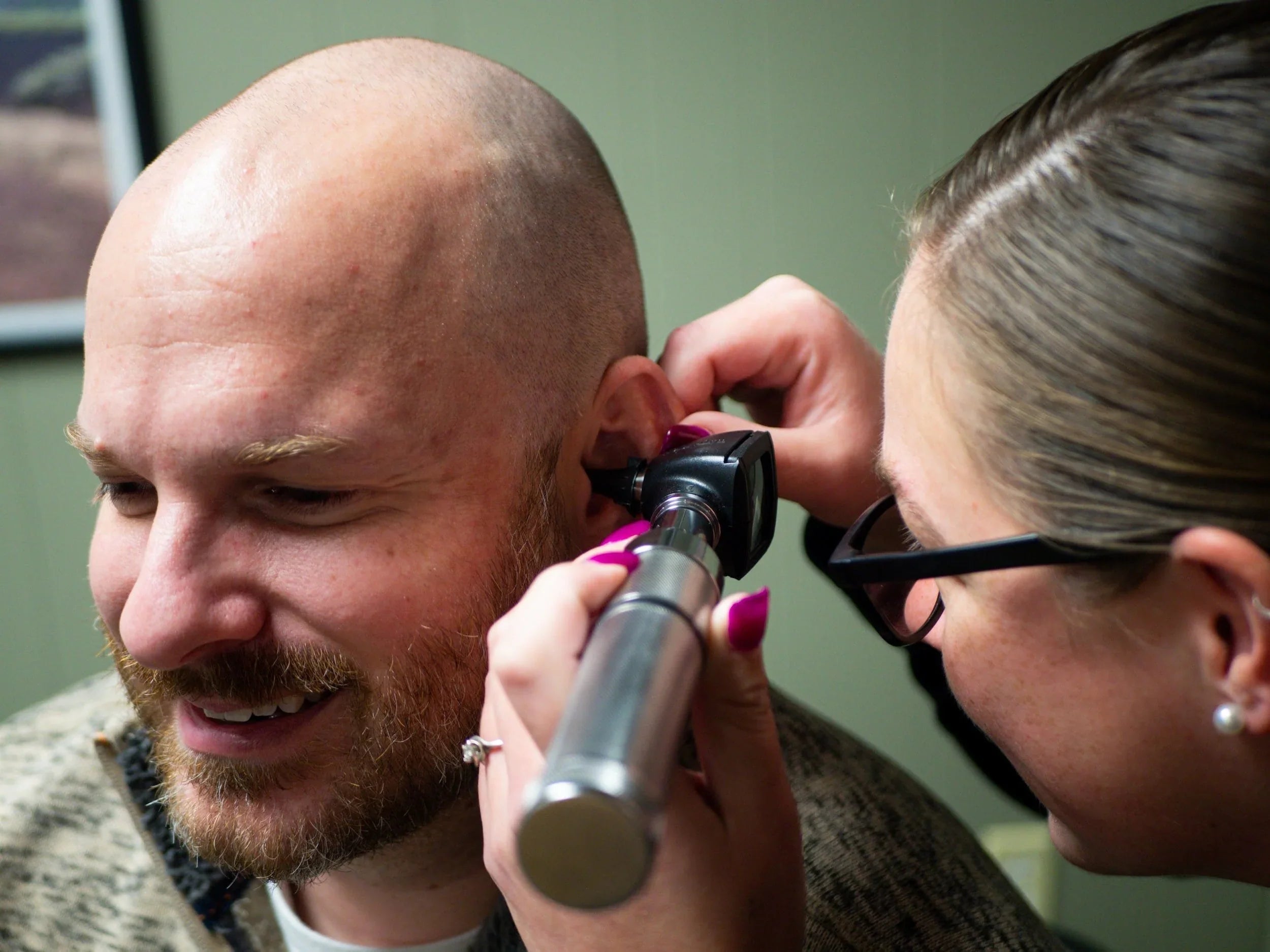 Image of Man Getting Ear Exam