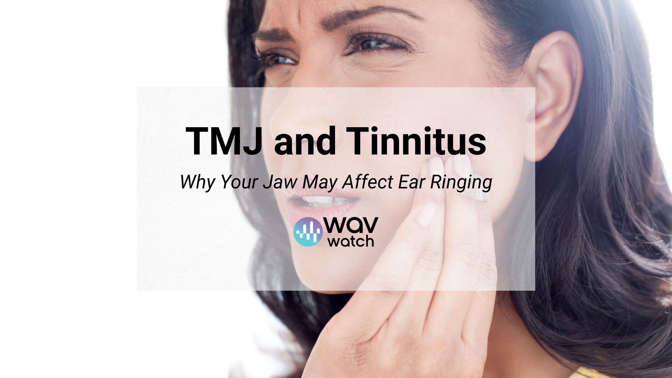 Image of a woman holding her jaw and flinching